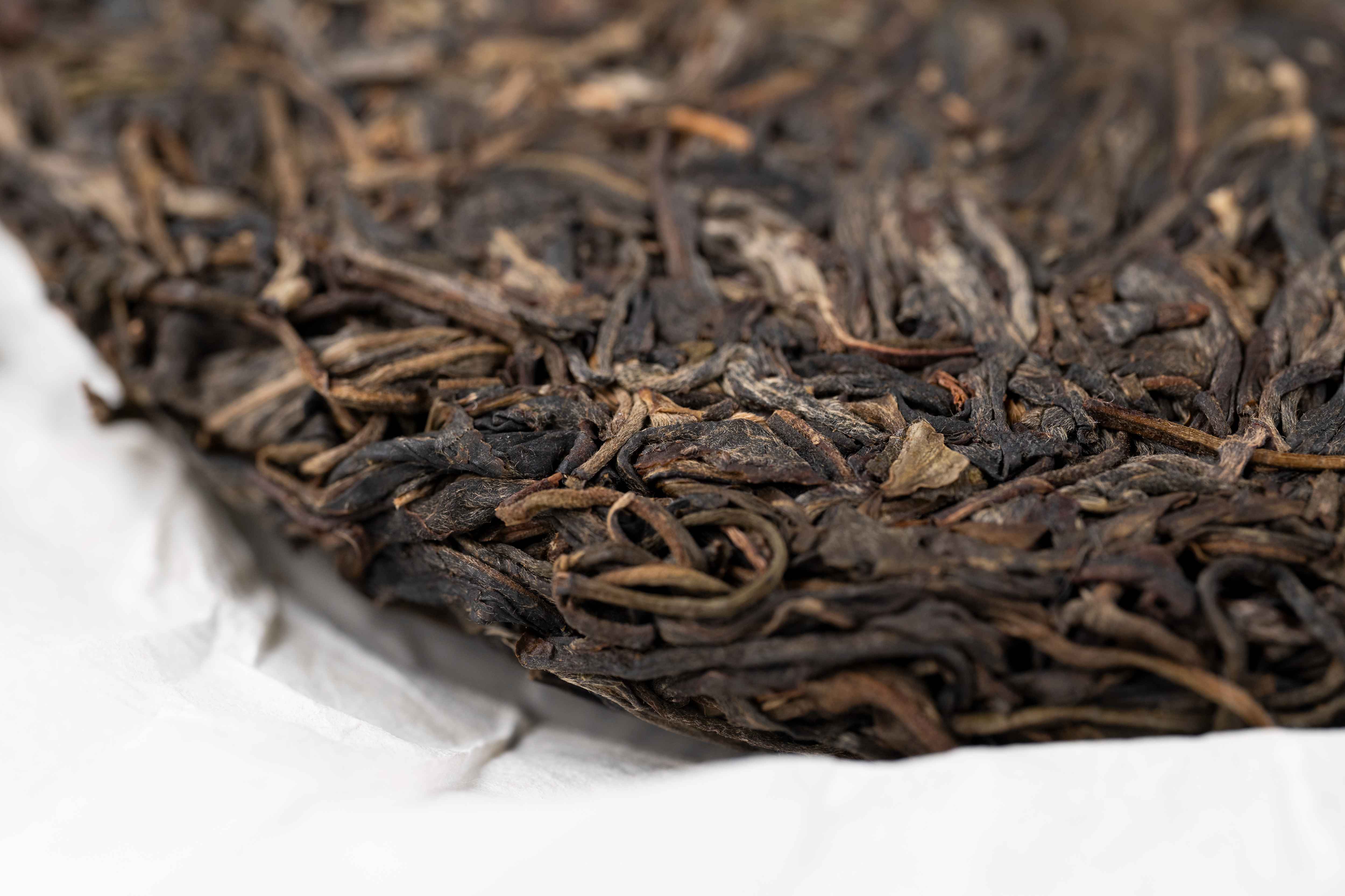 A close up of an aged tea cake