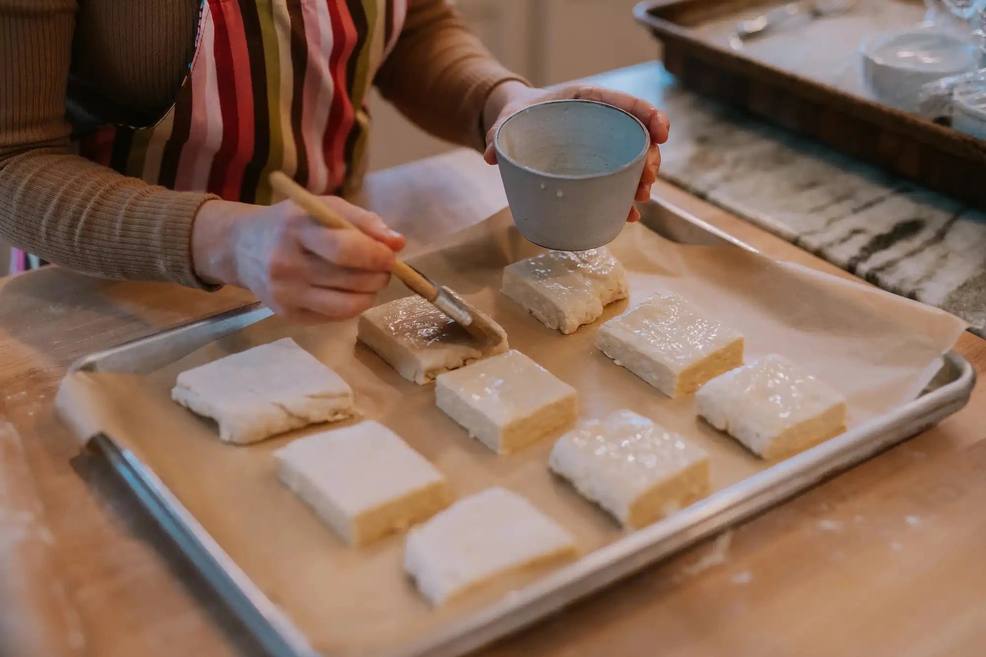 Brushing Biscuits with Honey Wash