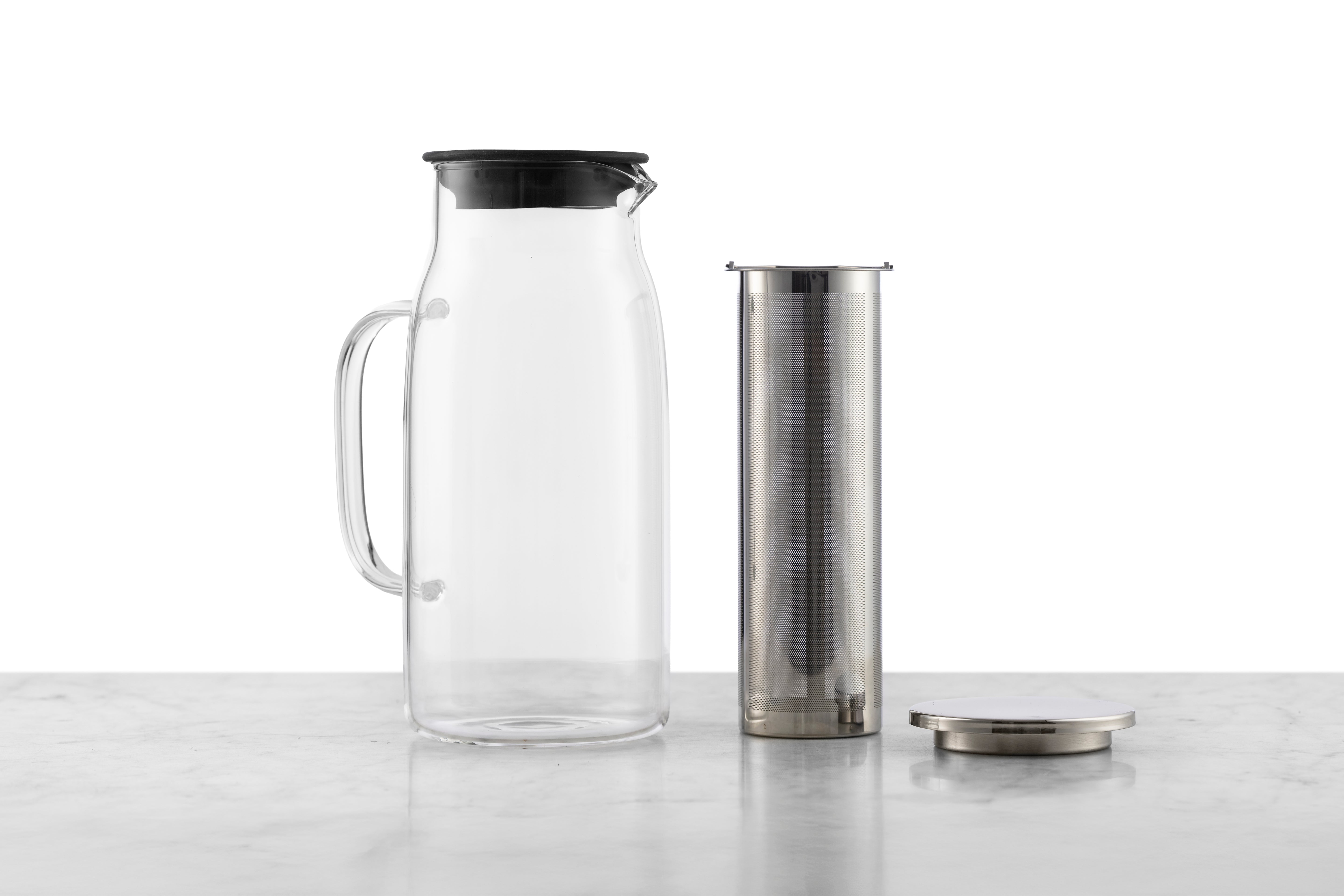 A 1 quart glass iced tea pitcher with a detachable infuser for loose leaf tea.