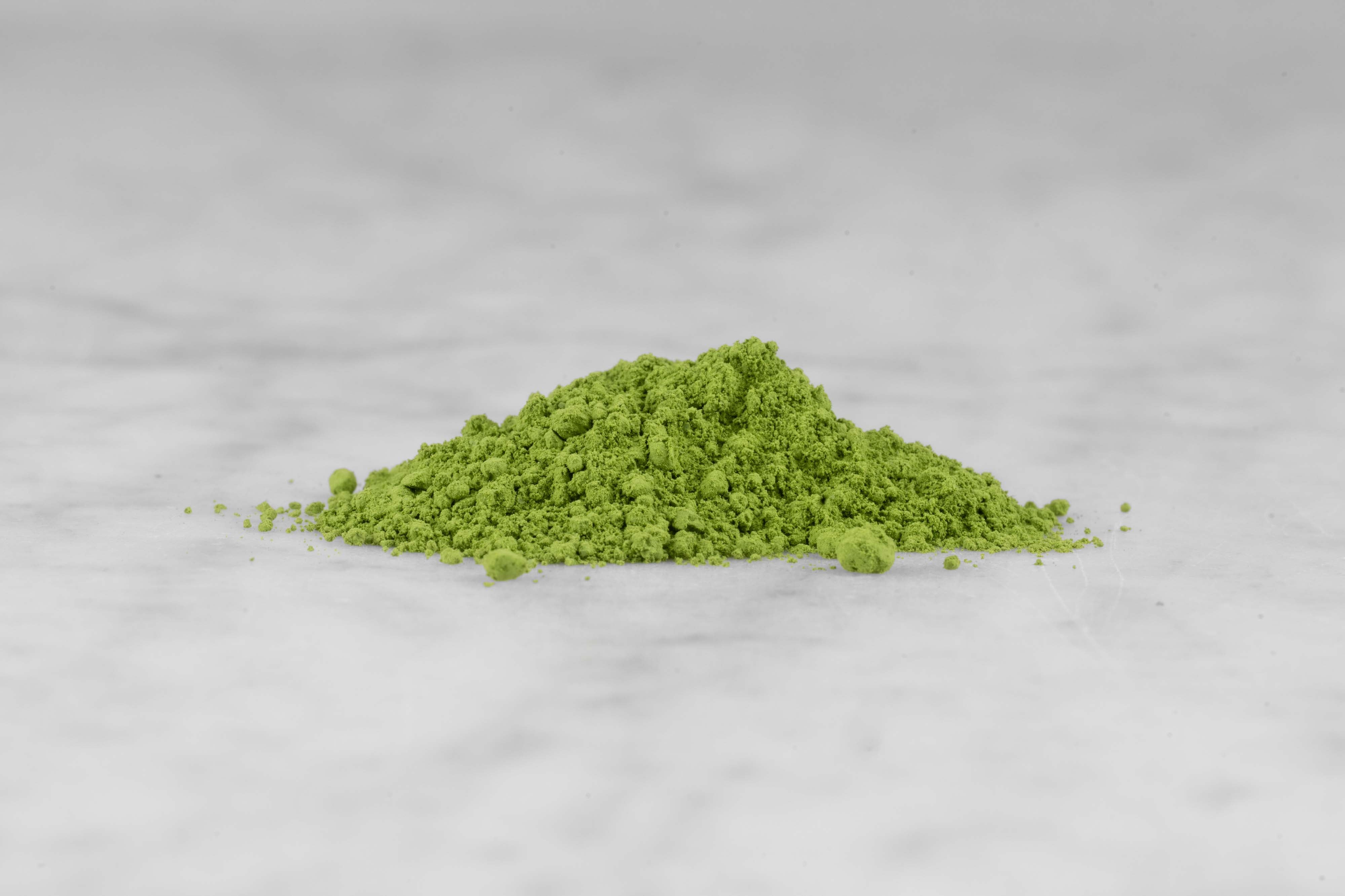 A small pile of organic Matcha Midori.
