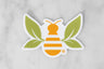 Saratoga Tea & Honey Co registered trademark tea bee sticker on marble background