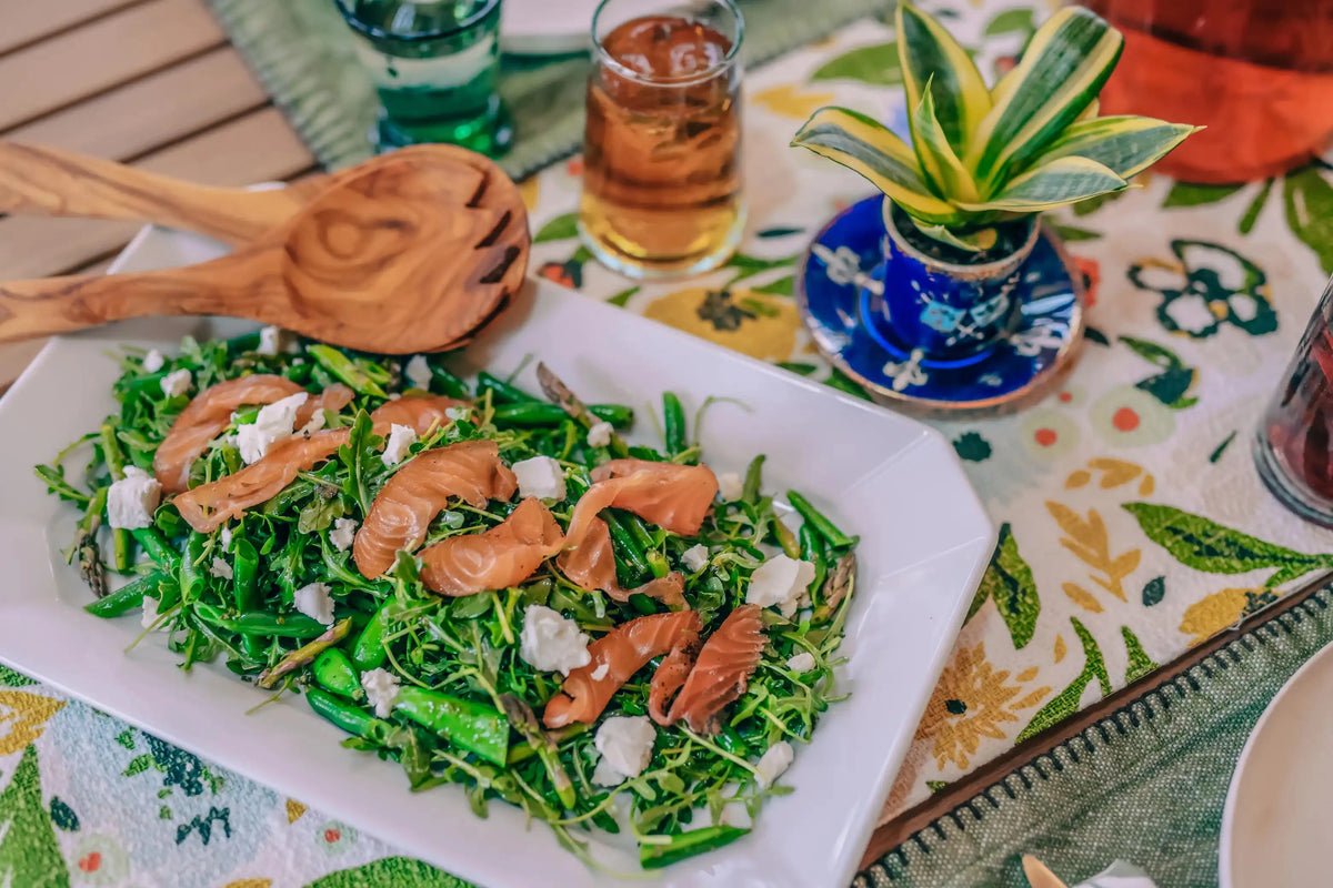 tea cured salmon on bed of arugala salad 