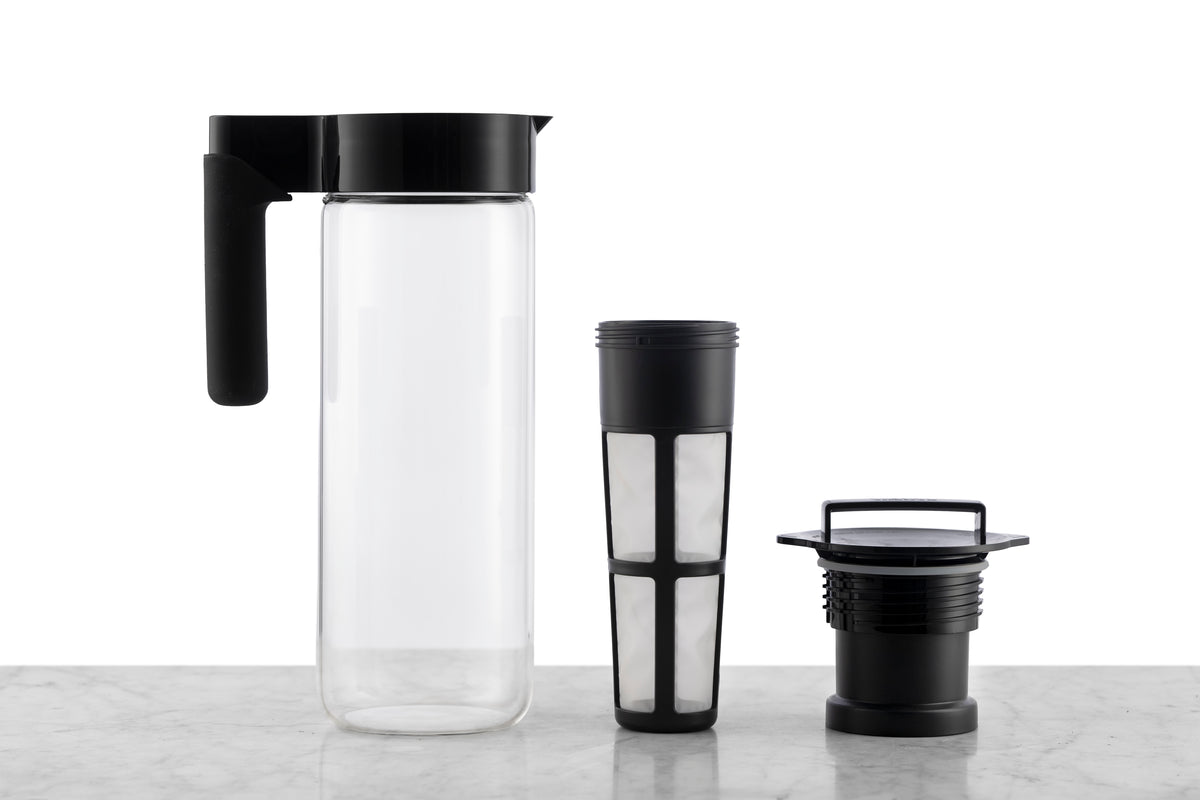 A 2 quart glass iced tea pitcher with a detachable infuser for loose leaf tea.