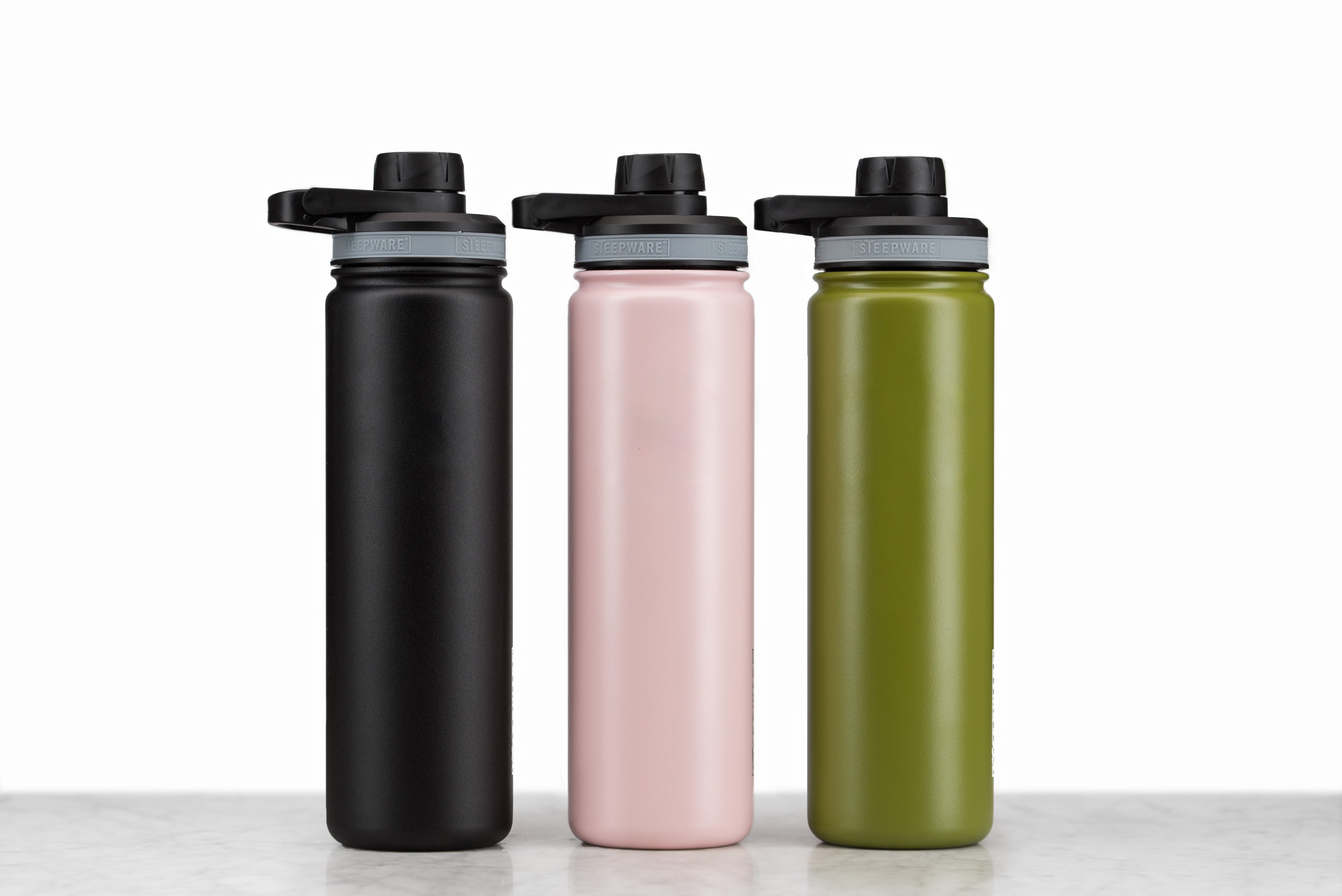 Black, pink, and green insulated steepware tea tumblers.