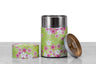 green and pink flower washi paper wrapped Japanese tea tin open to show inner seal