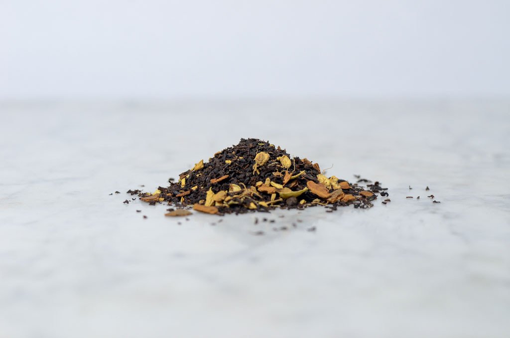 loose leaf pumpkin spice chai tea leaves on a marble background